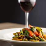 chefs choice vegetable pasta dish with red wine