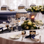 Round tables set for a wedding at Mercure Hotels