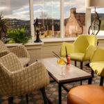 Drinks on a table in the conservatory overlooking the river ness at mercure inverness hotel