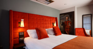 Bed in a privilege room in orange at mercure inverness hotel