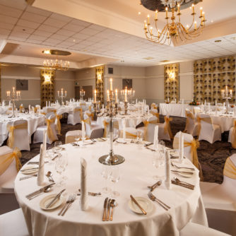 The Inverness suite with tables and chairs dressed for a wedding at mercure inverness hotel
