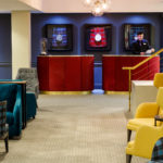 Brightly coloured chairs and sofas in the reception area at mercure inverness hotel